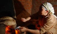 Egypt. Fayoume City. Making bread. Bread is a staple food in the Egyptian diet. © FAO/Ami Vitale