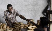 Haiti. Selling bread at the market in Les Cayes. © FAO/Giulio Napolitano