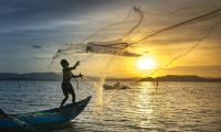 Fisherman at sunset. The Ocean is the main source of protein for more than a billion people around the world. Pixabay